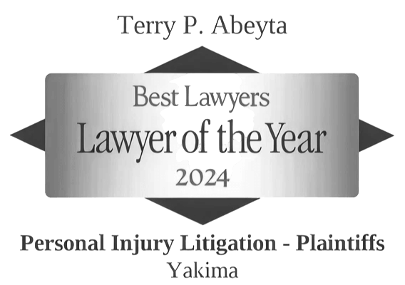 Award plaque stating "Terry P. Abeyta, Best Lawyers Lawyer of the Year 2024, Personal Injury Litigation - Plaintiffs, Yakima.